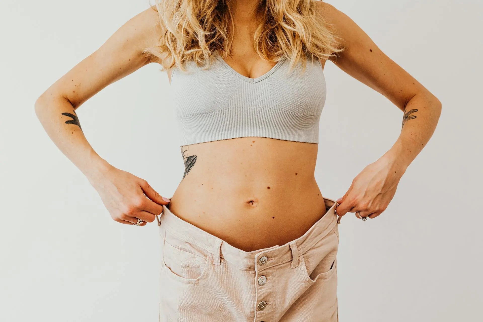 Transform Your Waistline: How to Lose Inches with Red Light Therapy - RICIAL