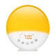 RICIAL Wake Up Light Sunrise Alarm Clock with yellow light and display showing 7:00 AM.