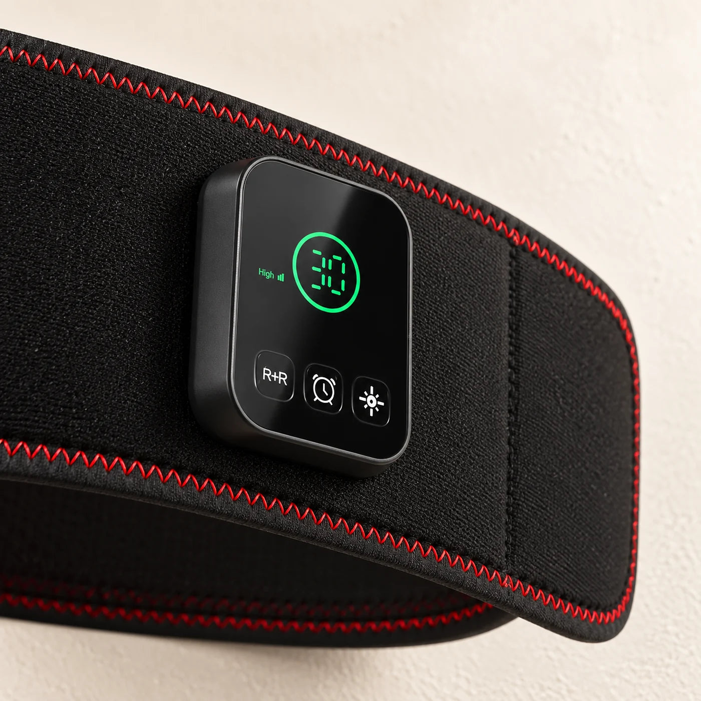 Close-up of the SlimLuma controller and red stitching