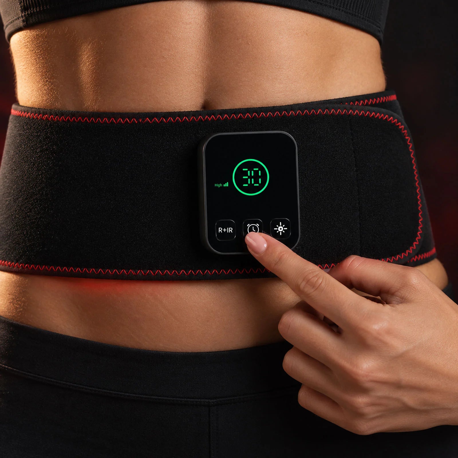 Hand adjusting the timer on the SlimLuma belt controller